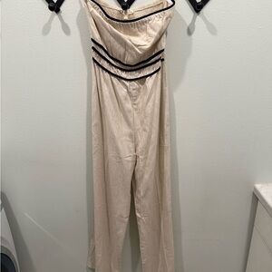 Elegant Cream Jumpsuit with Black Accents (new with tags)